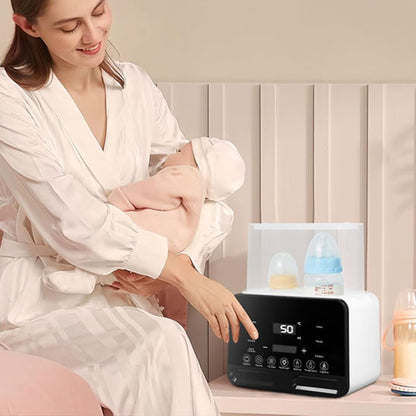 Maman-porte-bebe-met-en-marche-chauffe-biberon-sterilisateur